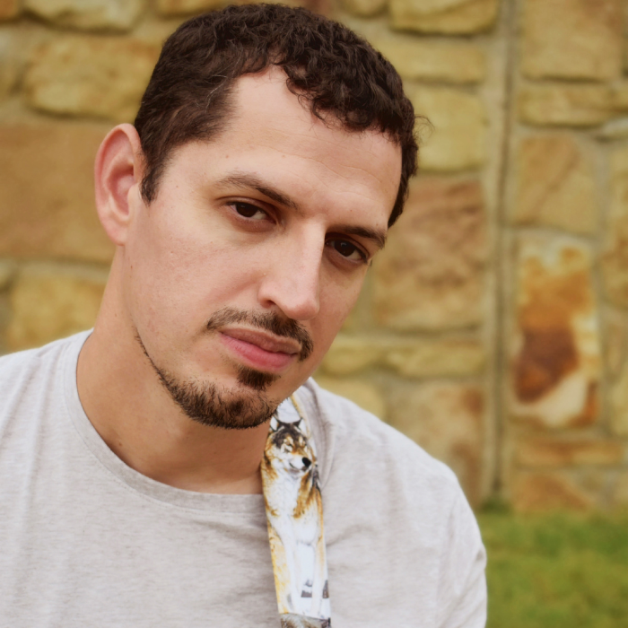 Sereno Wolf, North Texas indie rock and alt-pop musician, in a promotional headshot.