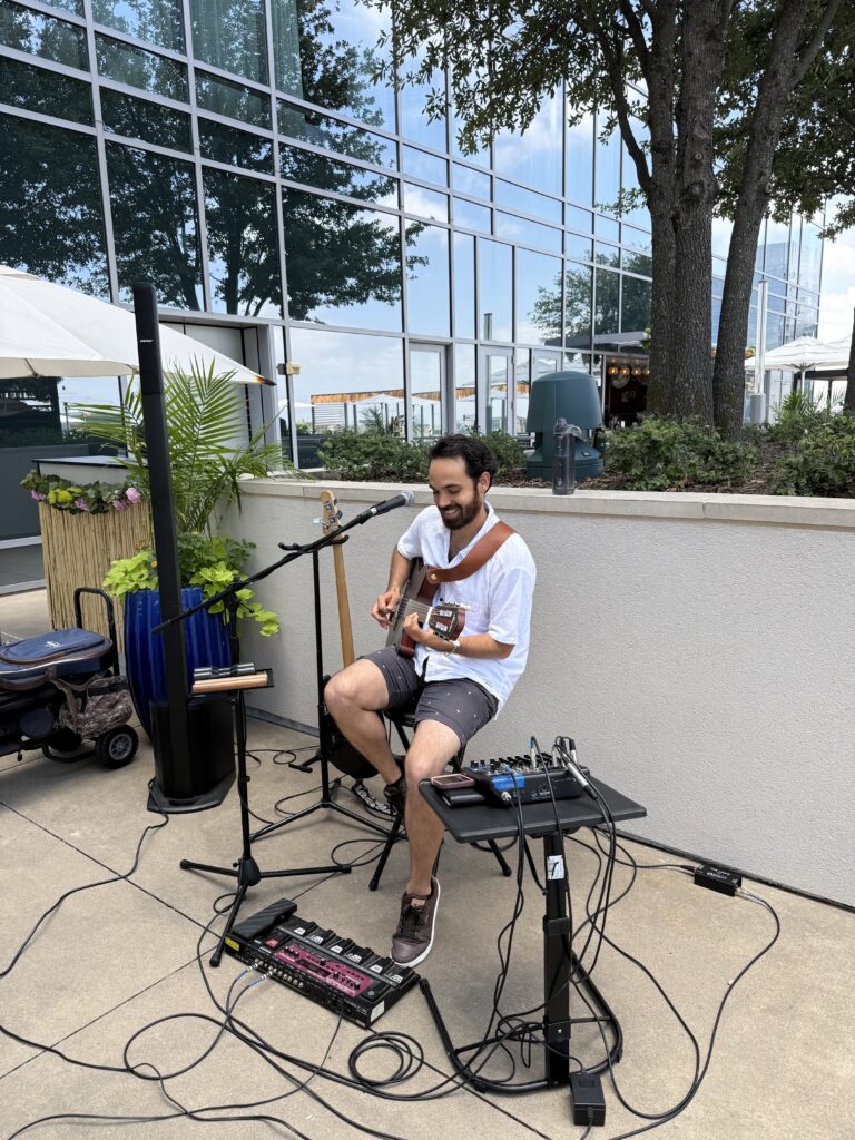 Local artist performing live at North Texas summer event - hotel poolside