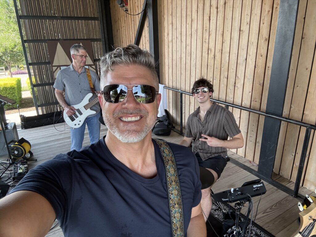 Local artist performing live at North Texas summer event - band performance