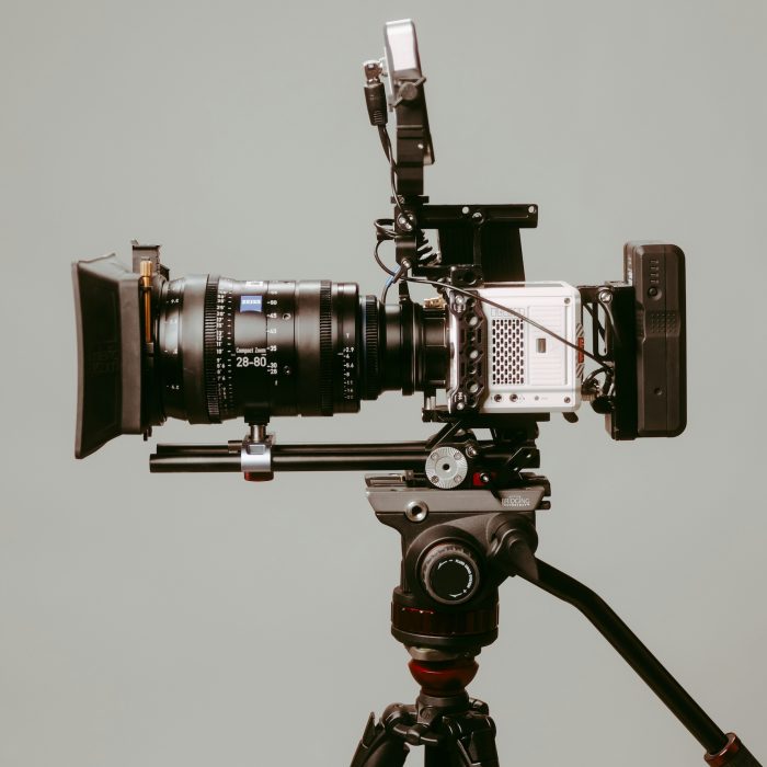 Side view of a video camera with a grey background