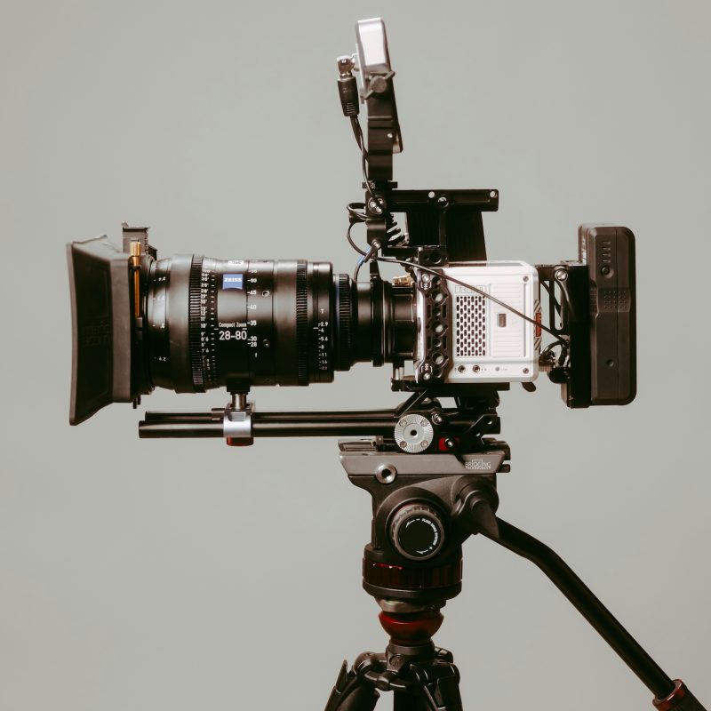 Side view of a video camera with a grey background